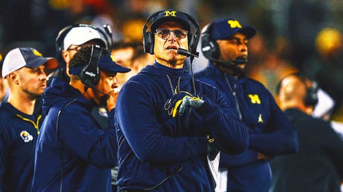 COLLEGE FOOTBALL Trending Image: Michigan's Jim Harbaugh says he'd take less money 'for players to have a share'